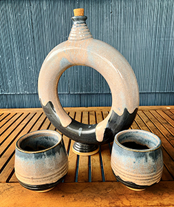 Image of James States ceramic, Ring Bottle and Cups.